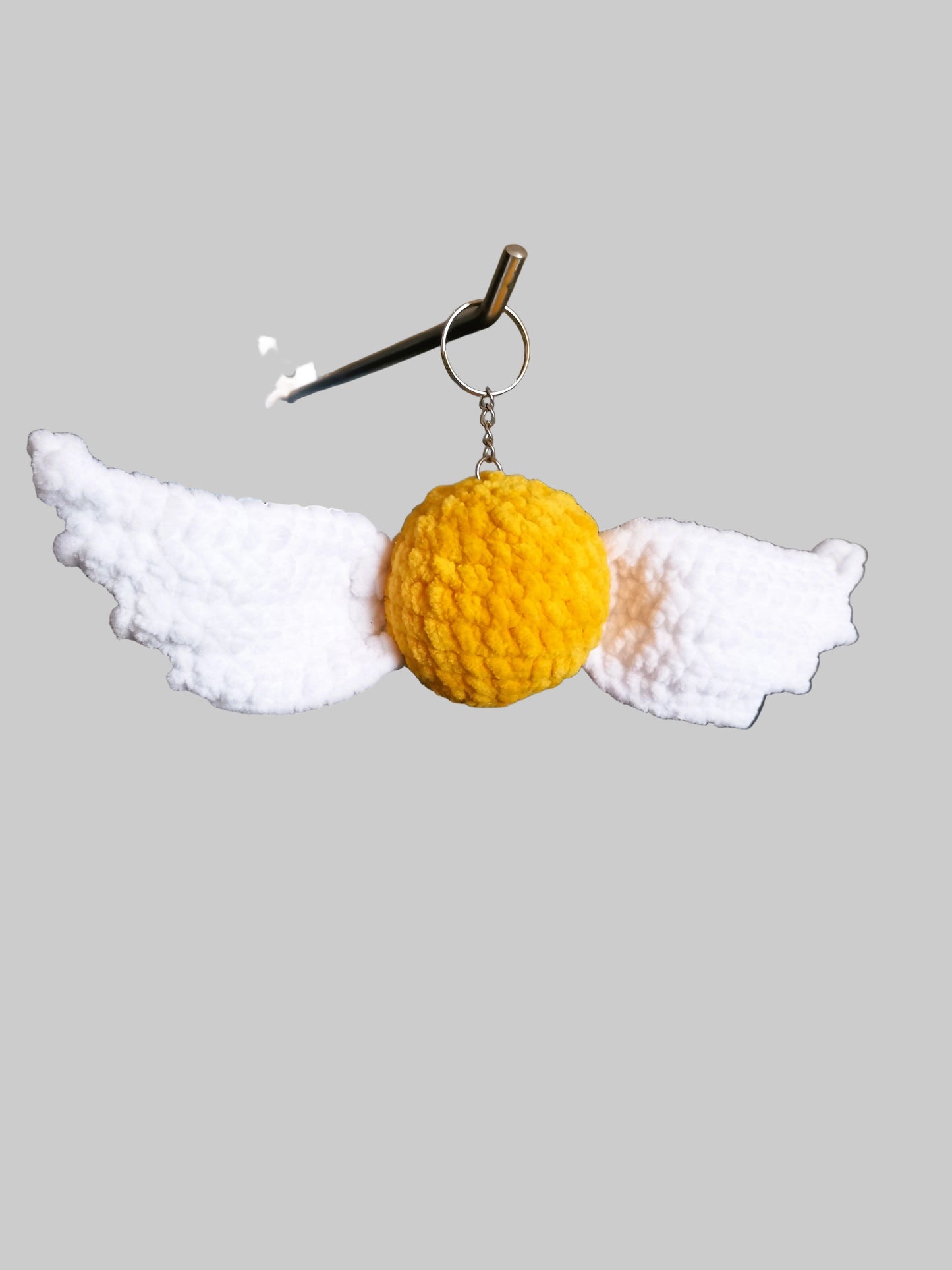 Handmade Crochet Plush – The Golden Snitch